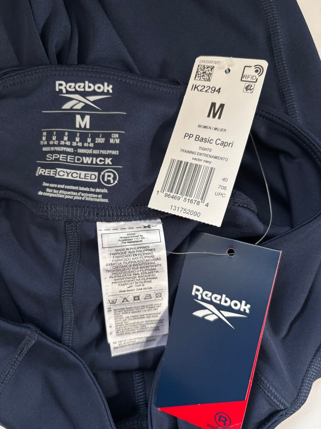 Reebok Women's Medium Workout Ready Vector Navy Capri Leggings NWT