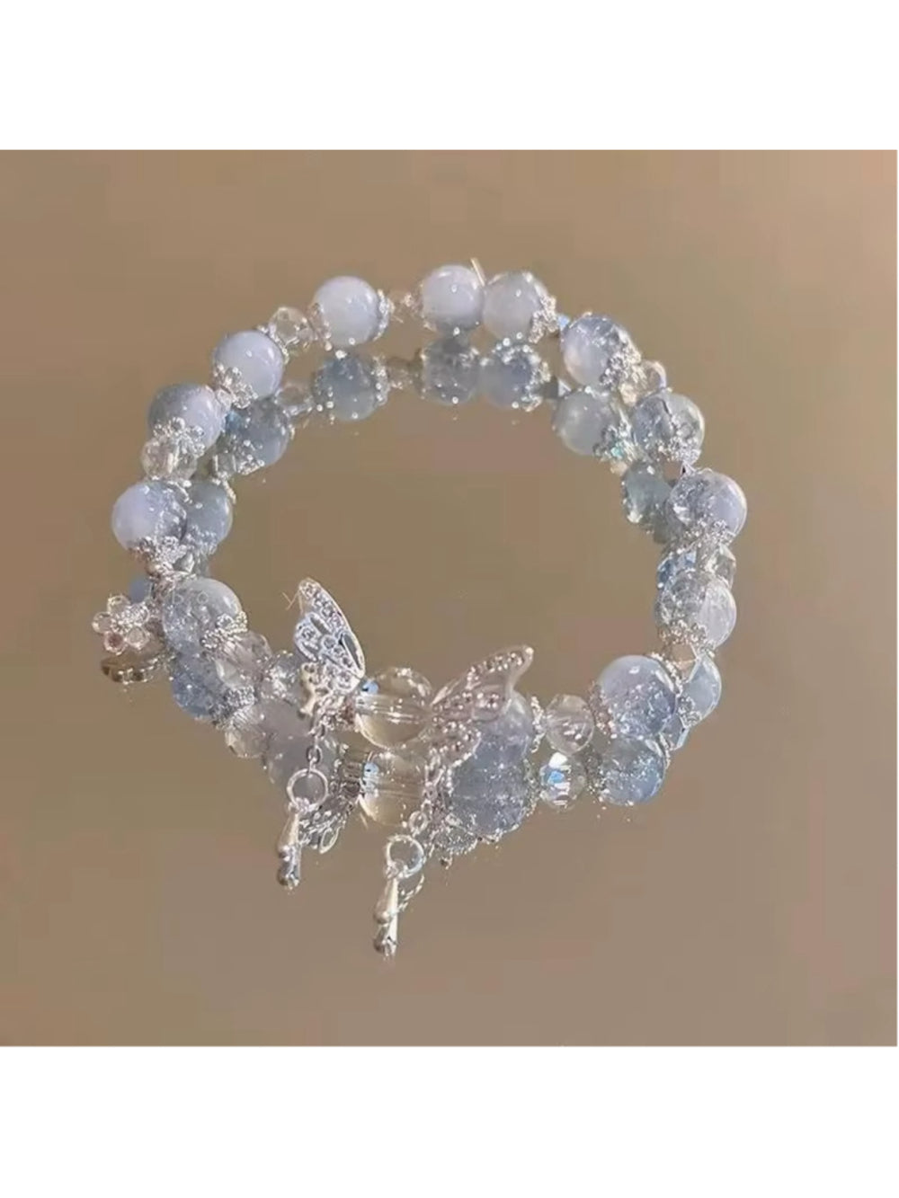 Pretty Blue and White Crackle Bead and Butterfly Charm Stretchy Bracelet NWT